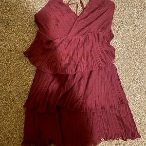 This is a brand new burgundy dress, size s, has ruffles and is comfortable!!